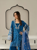 Elegant blue formal outfit featuring intricate embroidery and a sheer dupatta.