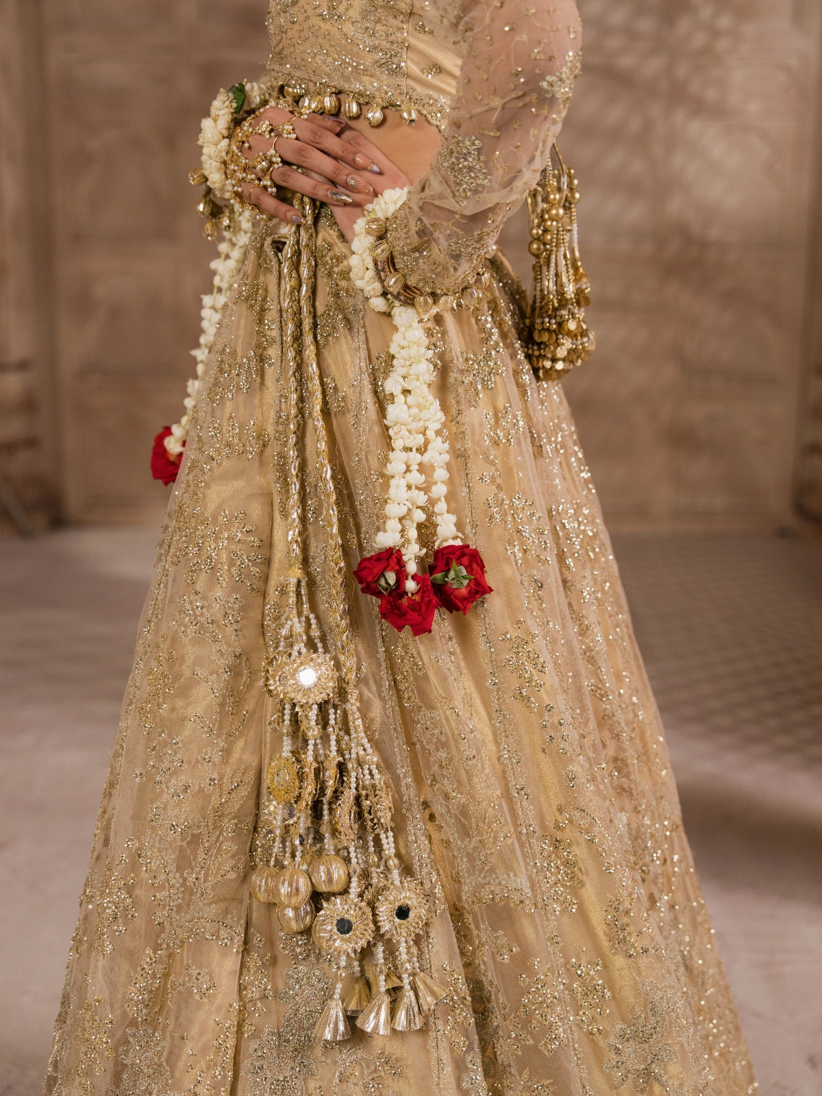 Luxury Pakistani wedding dress with traditional gold embroidery