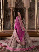 Traditional mauve lehenga with a heavily embroidered blouse