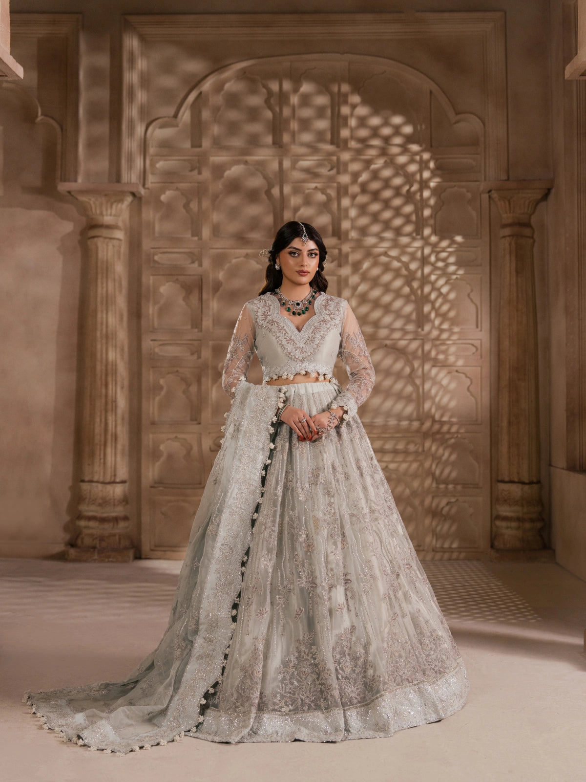 pearl grey embroidered lehenga with matching net dupatta