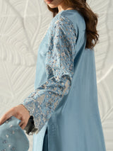 Elegant women's eastern wear featuring a sky blue kameez, decorative neckline, and matching dupatta.