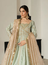 Luxury mint green festive outfit with a sheer gold striped dupatta.