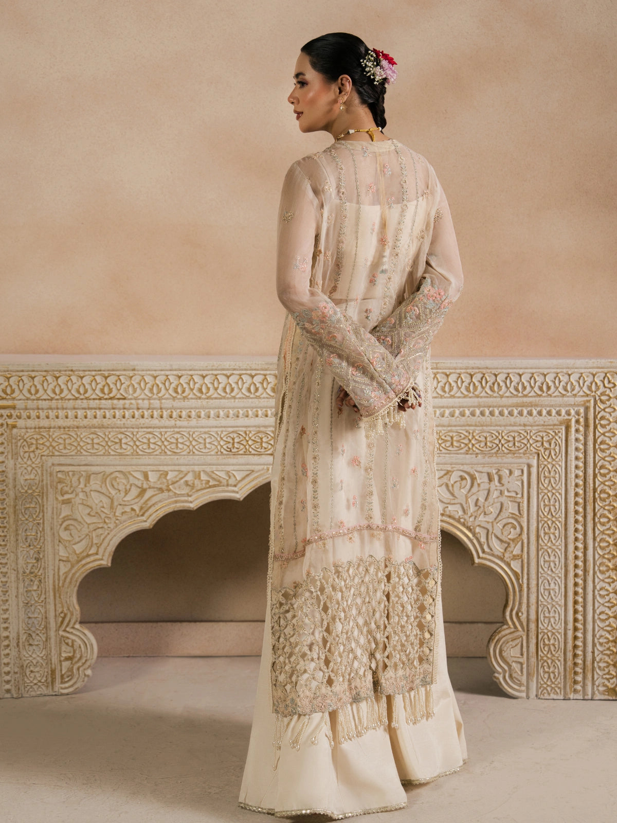 Luxury Pakistani formal outfit in ivory beige with delicate embroidery