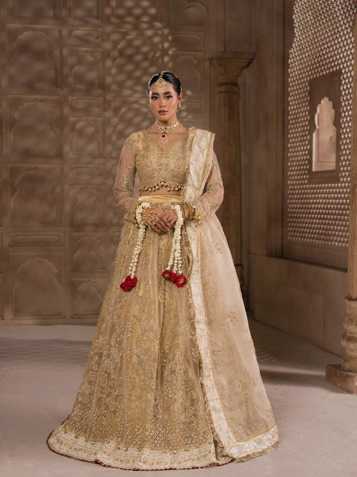 Luxury golden embroidered bridal lehenga with matching dupatta