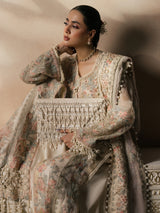 Luxury traditional dress with delicate floral patterns and tassel details