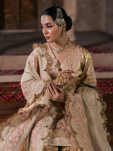 Premium Pakistani wedding ensemble with gold sharara and embroidered shirt