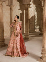 Rose pink traditional wedding outfit with intricate embellishments