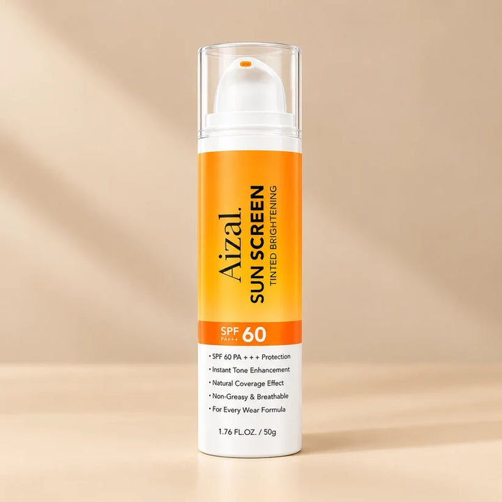 A bottle of  Sun Screen SPF 60 tinted brightening lotion, featuring a white and orange label with a clear cap, set against a warm beige background with soft diagonal shadows.