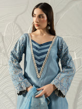 Traditional Pakistani sky blue dress with subtle embellishments and a graceful full-length silhouette.