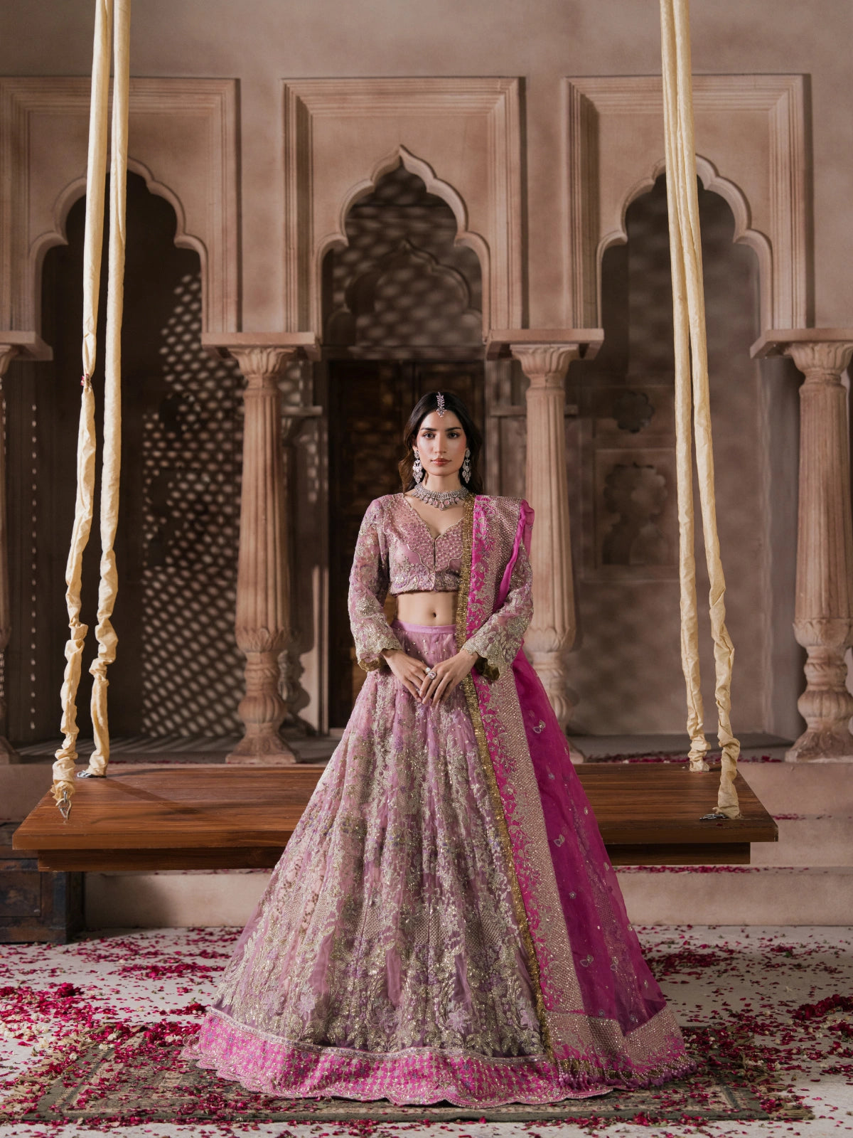 Luxury Pakistani bridal lehenga with intricate gold embroidery